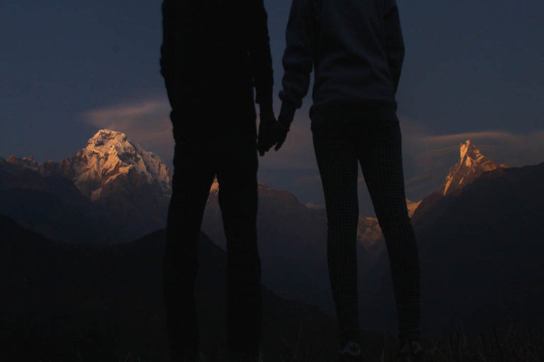 two_people_holding_hands