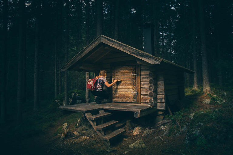 hiker_entering_cabin